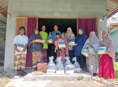 มอบถุงยังชีพให้กับสมาชิกสหกรณ์ที่ได้รับผลกระทบจากอุทกภัยน้ำท่วมในพื้นที่ อำเภอทุ่งยางแดง ... พารามิเตอร์รูปภาพ 1